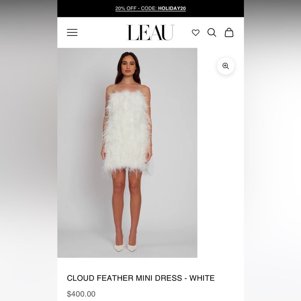 Never been worn- size XL LEAU white feather dress.